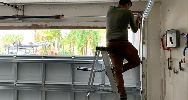 Garage Door Tension Spring Replacement in Brent, FL